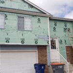 A picture of exterior siding repairs on a home by performance construction.