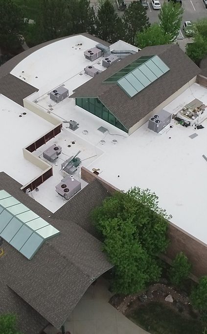 A picture of a roofing installation by Performance Construction in Colorado.